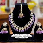 Beautiful Kundan Neckline With Jhumka And Tika set