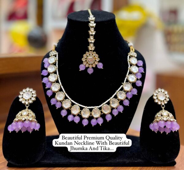 Beautiful Kundan Neckline With Jhumka And Tika set