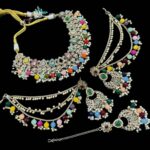 Gold plated polki Necklace + bahubali earrings + tikka